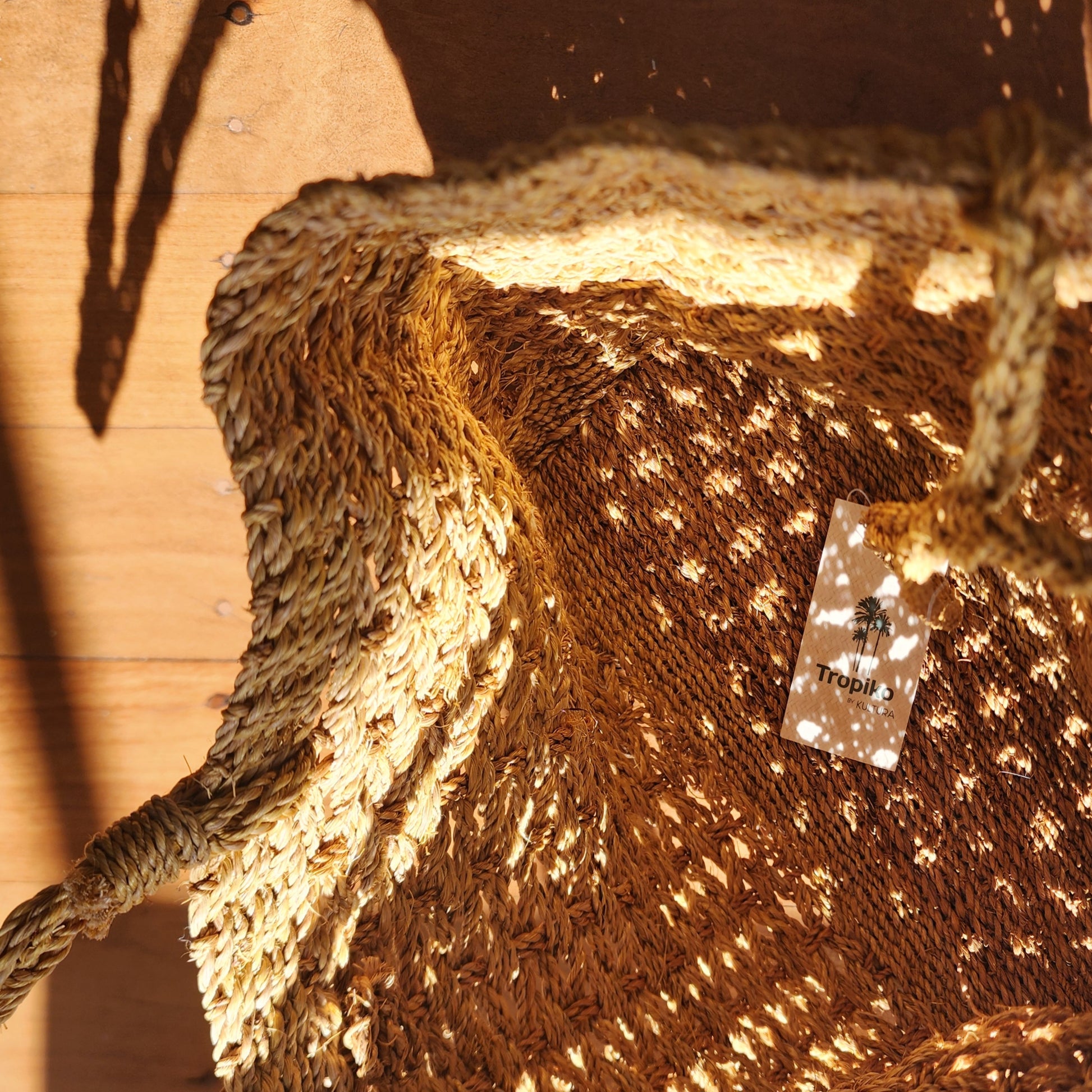 Medium sized woven Tropiko shoulder bag available at Wilson Avenue