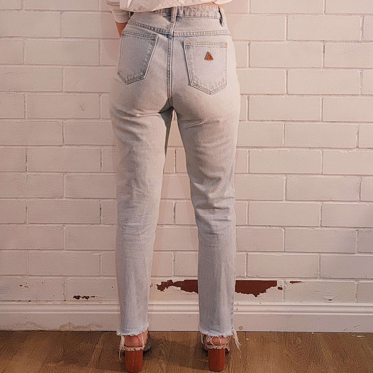 Abrand 94 high slim jeans, size 27/9. Light wash frayed hem blue denim jeans