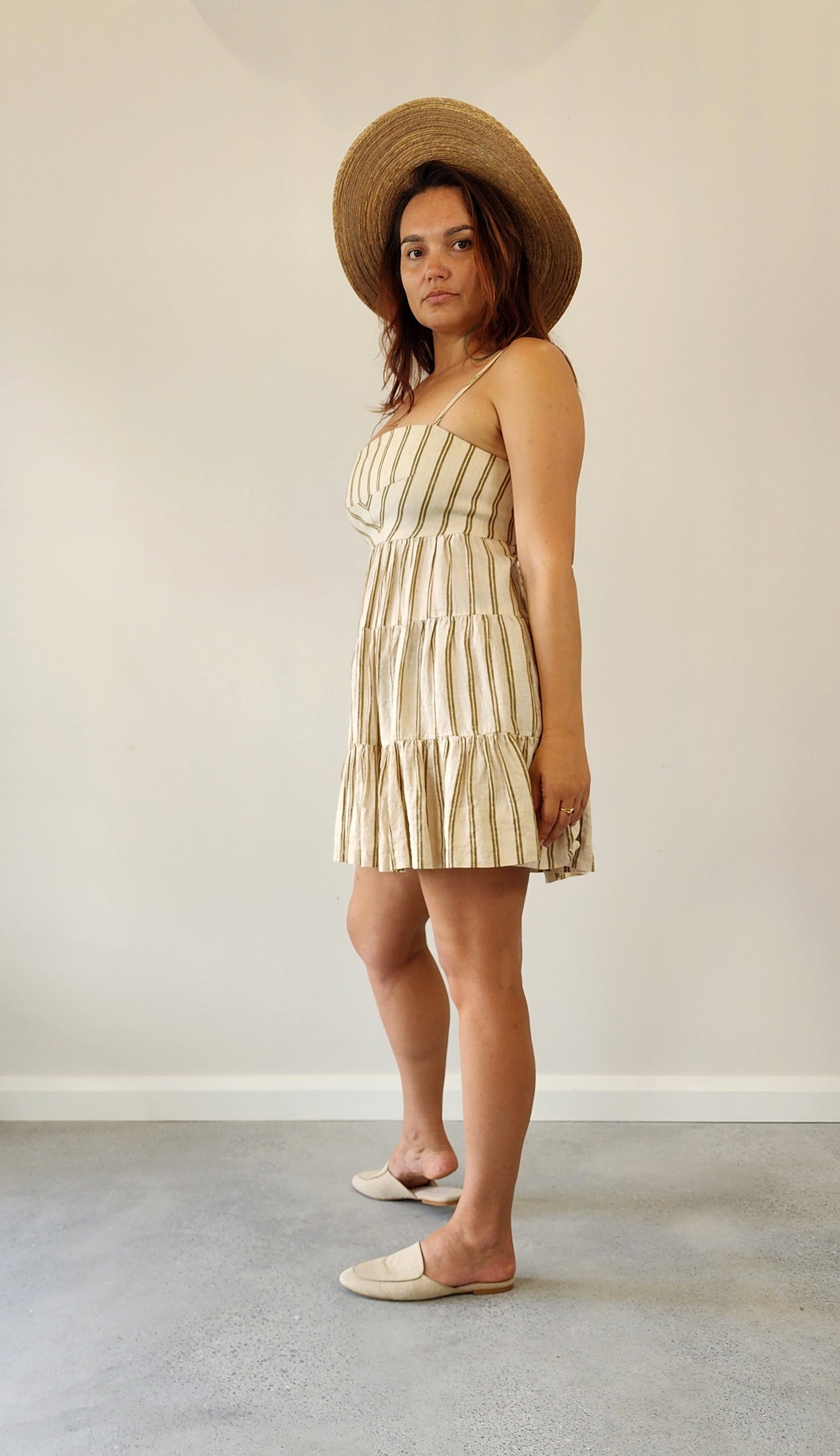 Linen tiered mini dress by Shona Joy, adjustable style in a women's size 12.