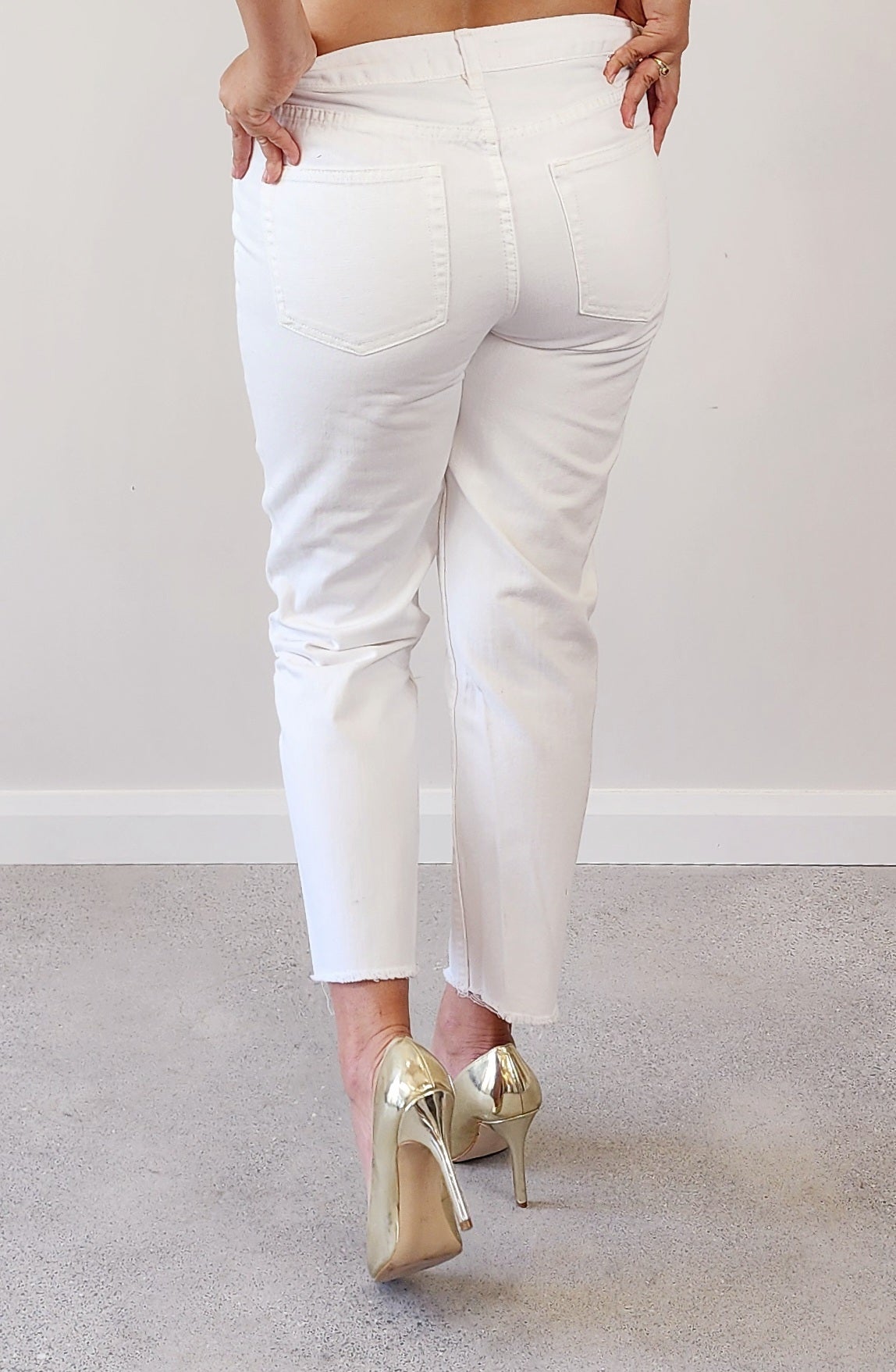 Back of Assembly Label white jeans. raw hem jeans for sale at Wilson Avenue