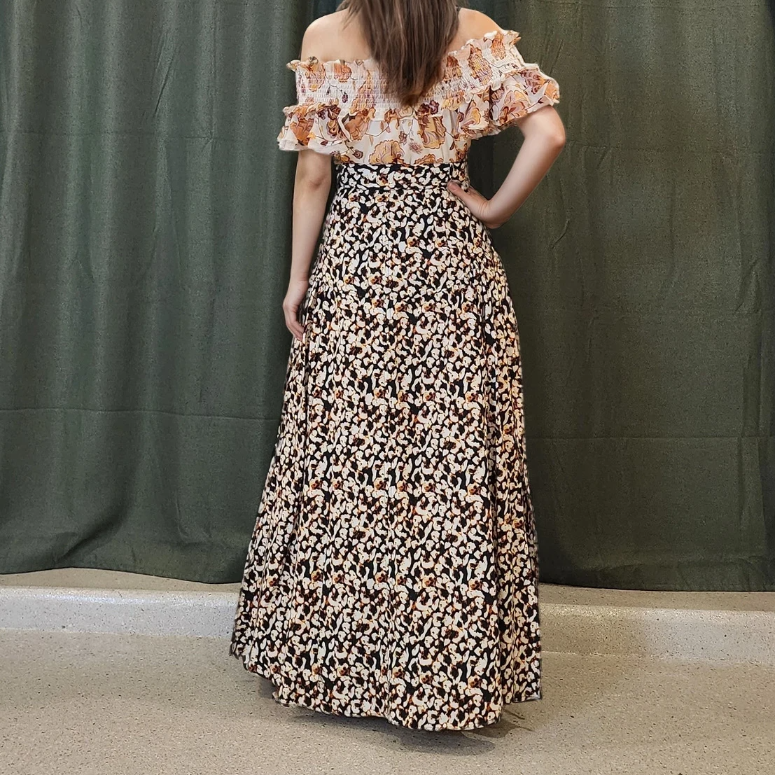 Model wearing the Willow skirt, showing the soft A-line shape, high waistline and abstract print.