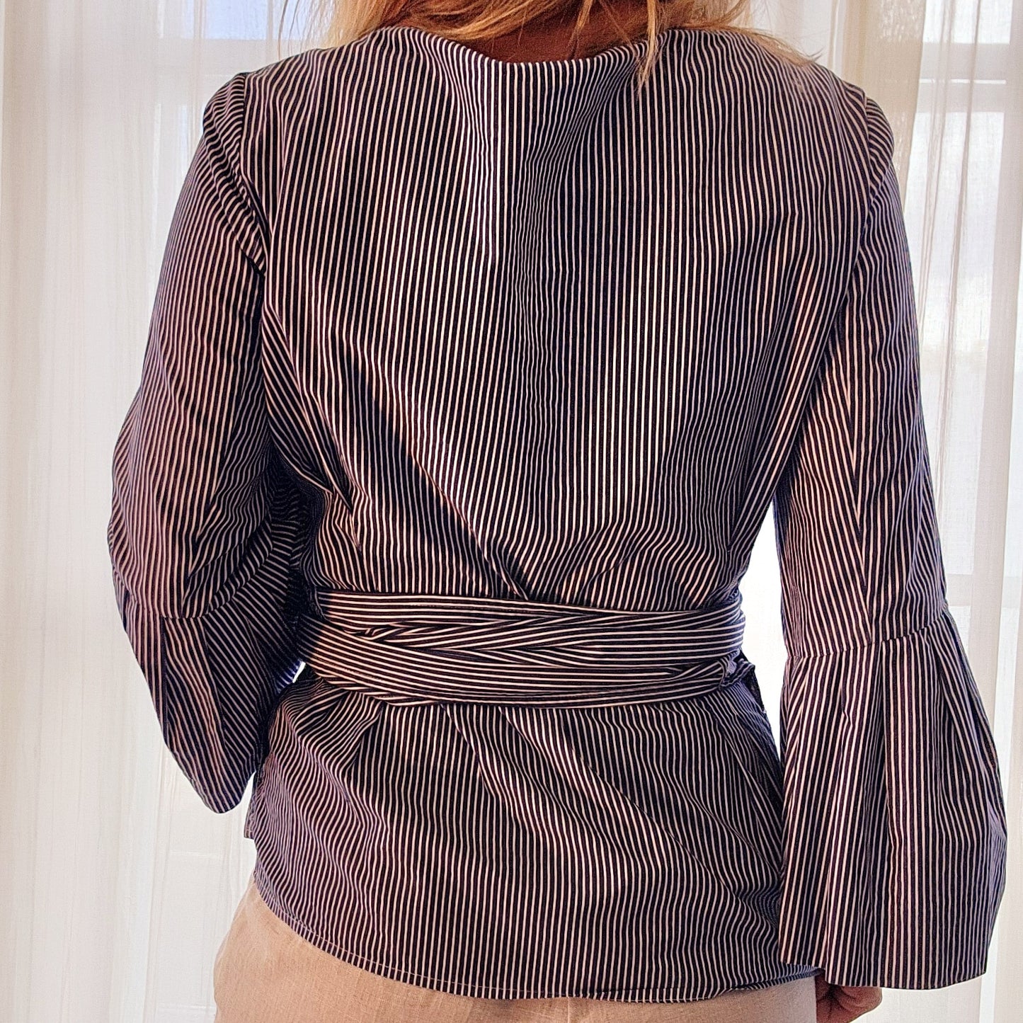 Striped Camilla and Marc C&M V neck wrap top in striped blue and white.