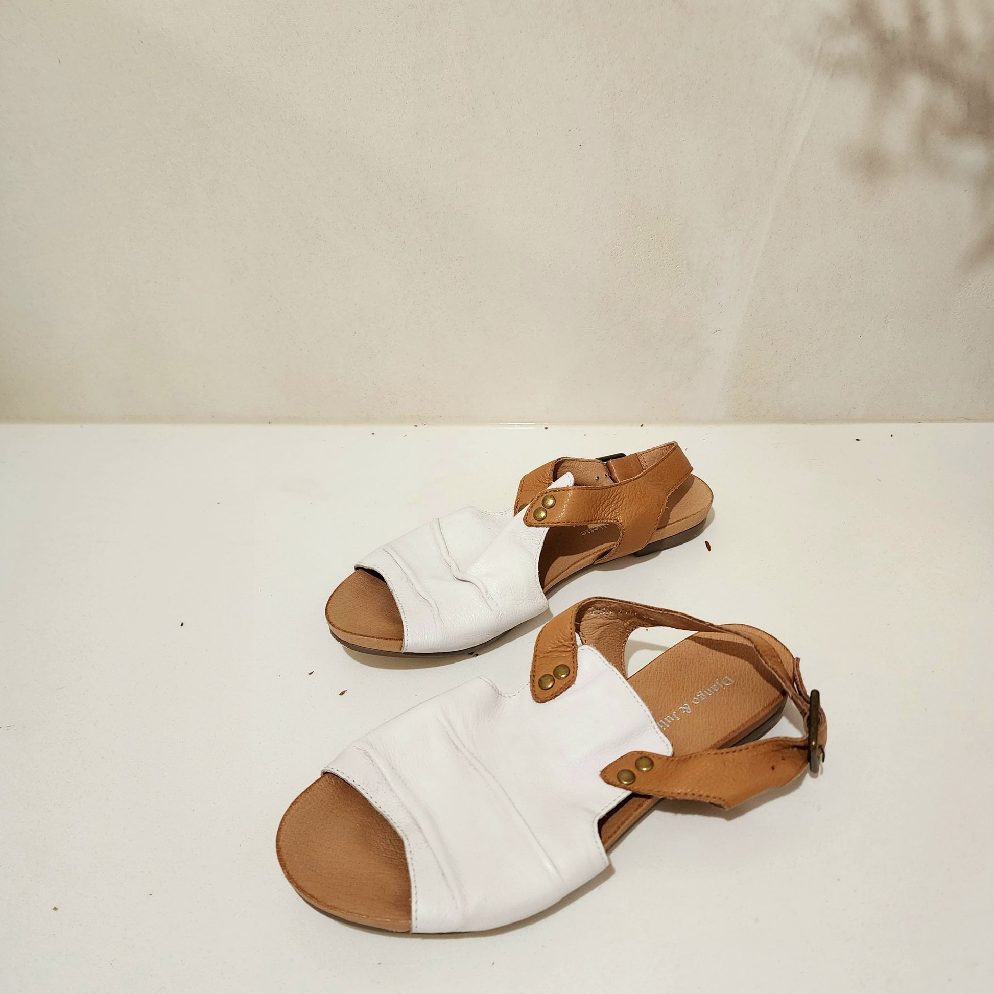 White and tan leather sandals in a size 36 for sale online at Wilson Avenue
