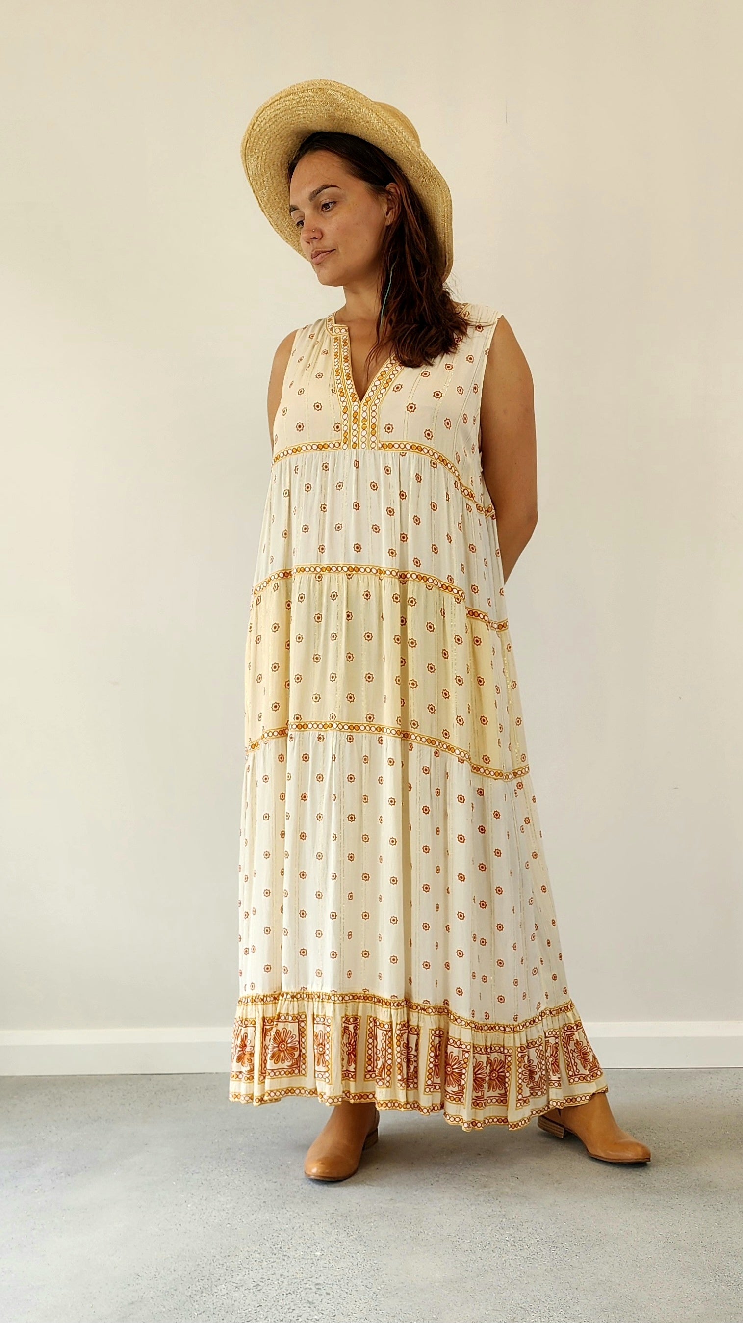 Byron Bay designer Foundling tiered dress, in cream with mustard, gold and rust printed floral design