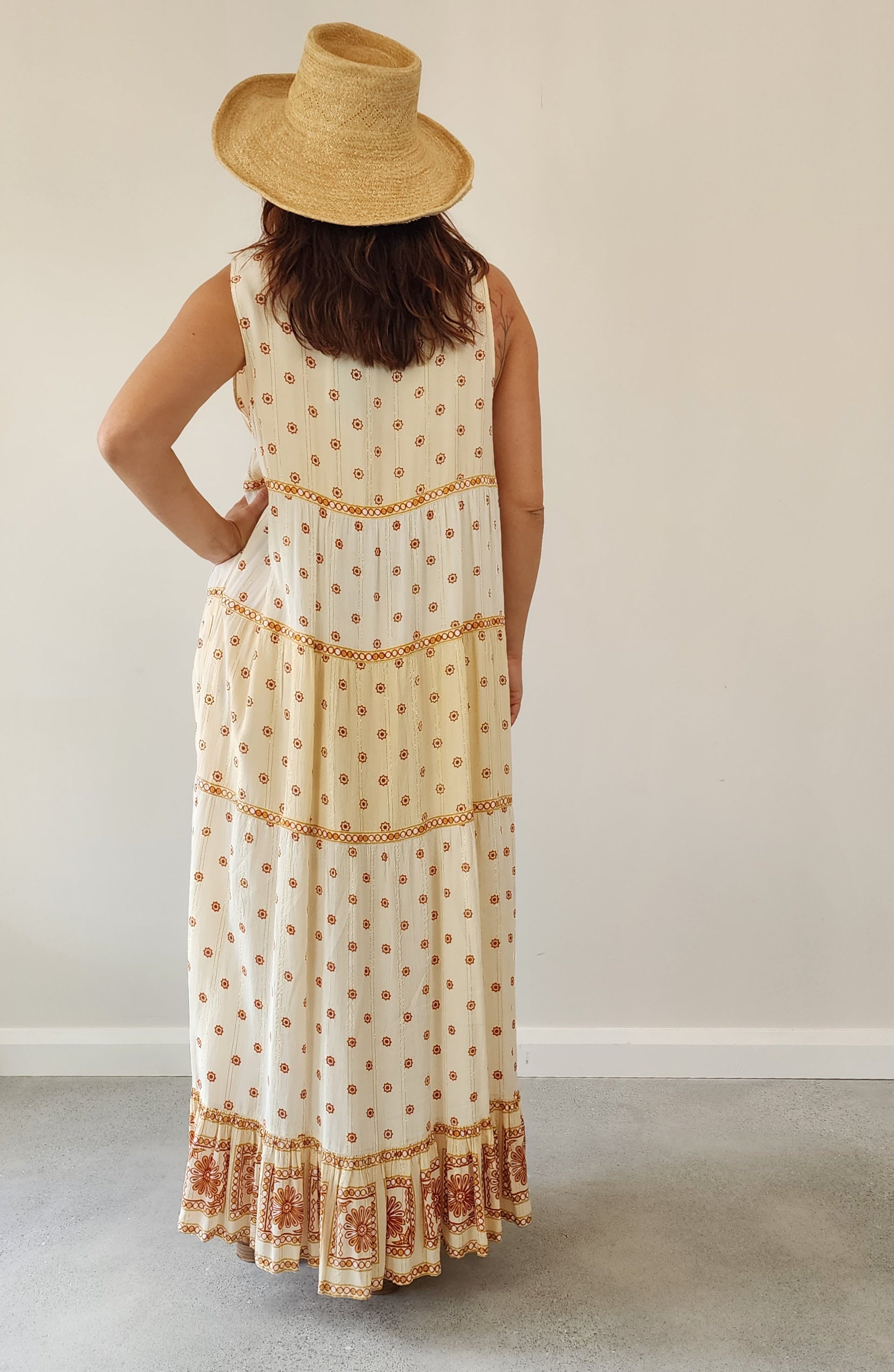 Byron Bay designer Foundling tiered floral dress, in cream with mustard, gold and rust printed floral design