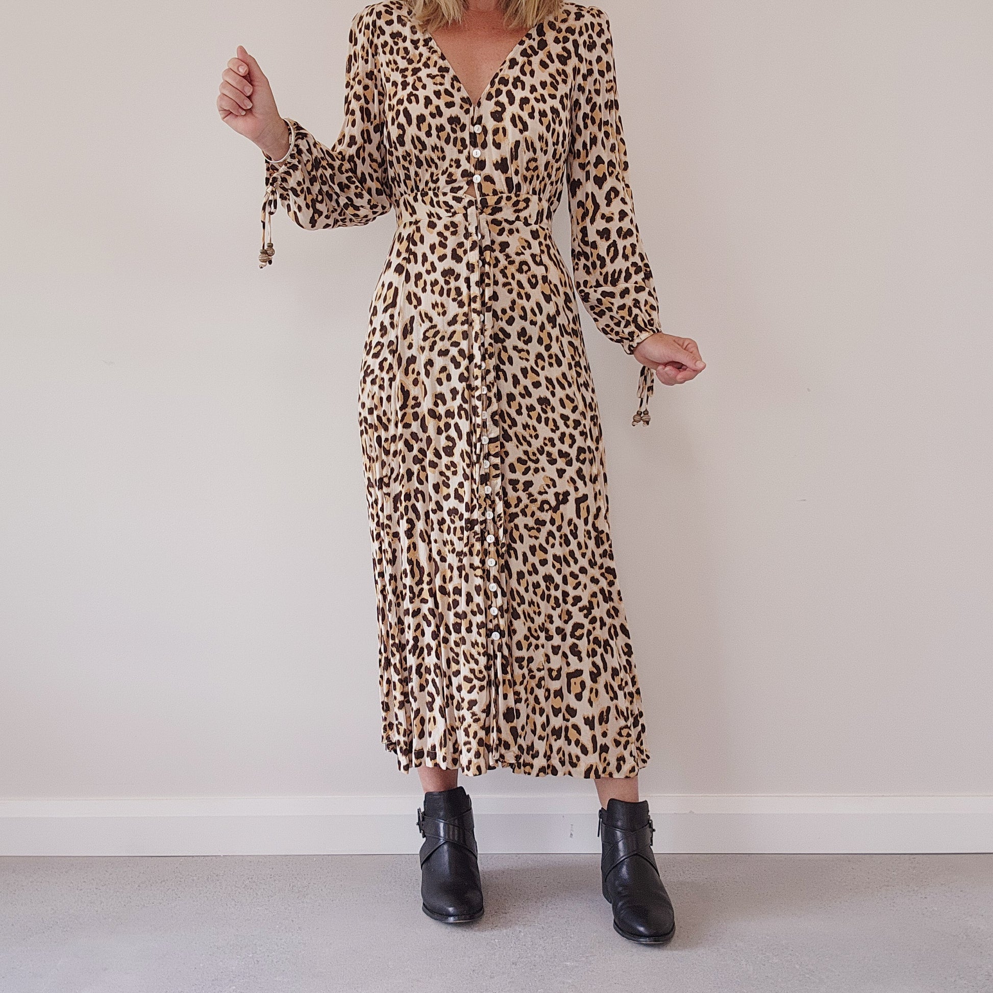 Kivari xxs Bellini tie front midi dress, animal print.