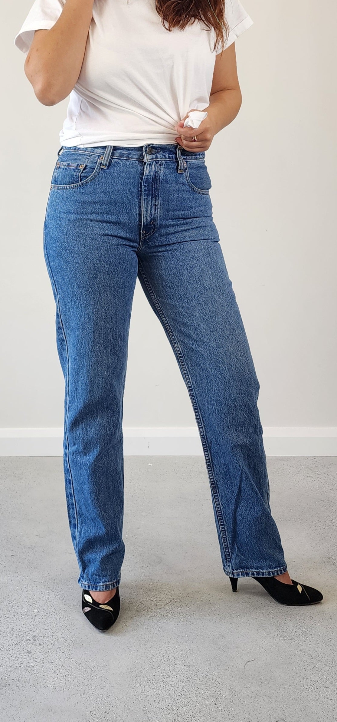 Size 11 Levi denim jeans, mid rise, straight leg, blue jeans