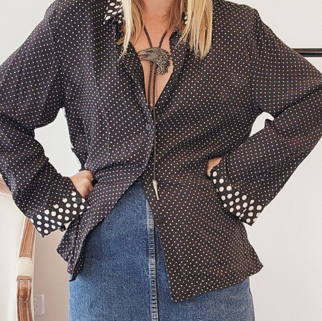Front view of 90s multi-pattern shirt, highlighting mixed polka dots and cuff details.
