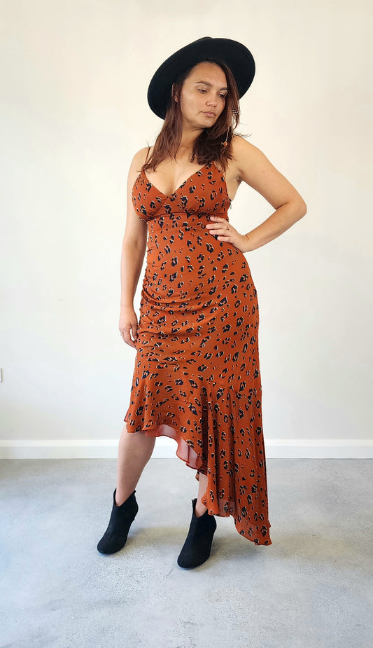 Secondhand Nicholas rust coloured animal print evening dress size 12