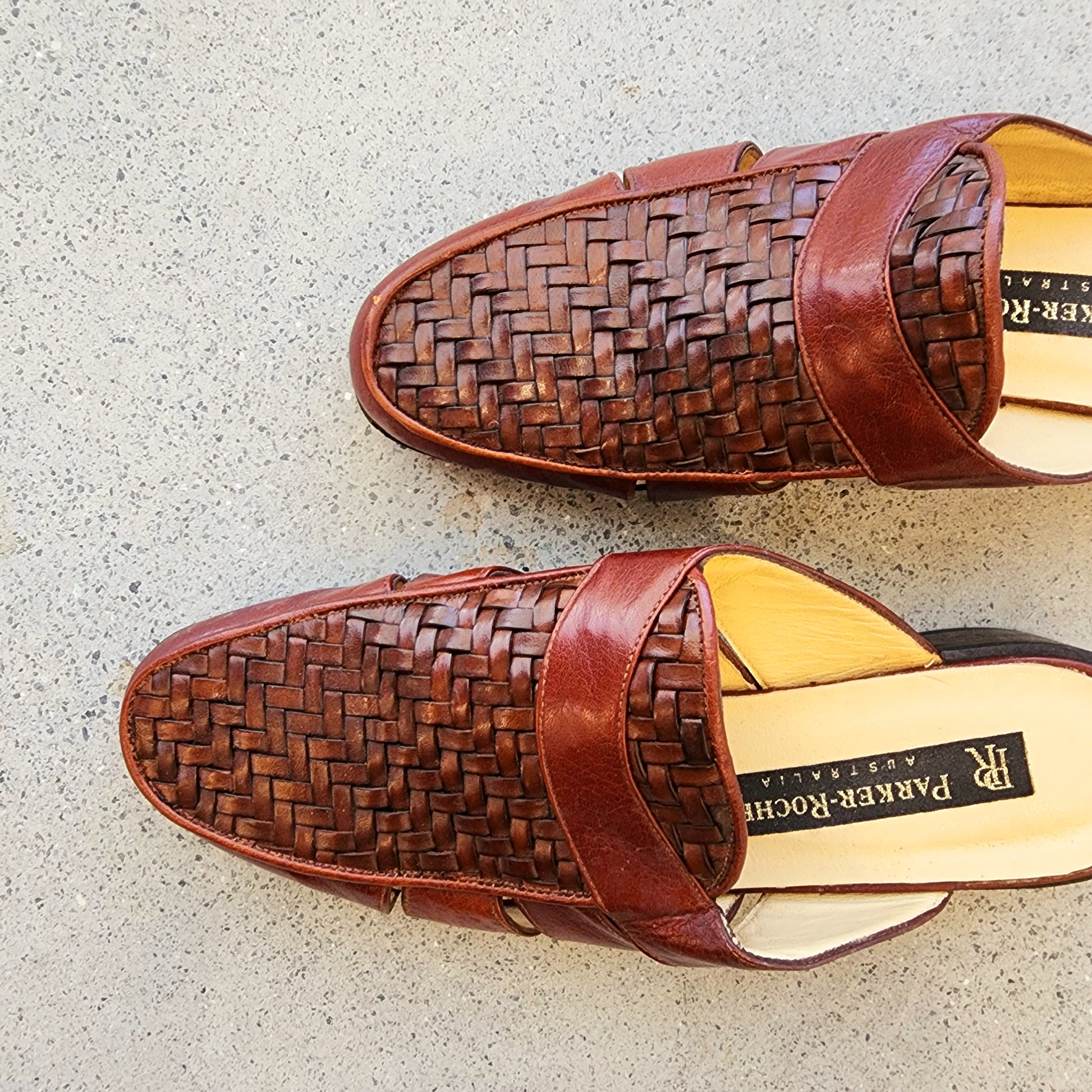 Top view of the Parker Roche leather woven mules, showing a close up of the woven style and the new condition.