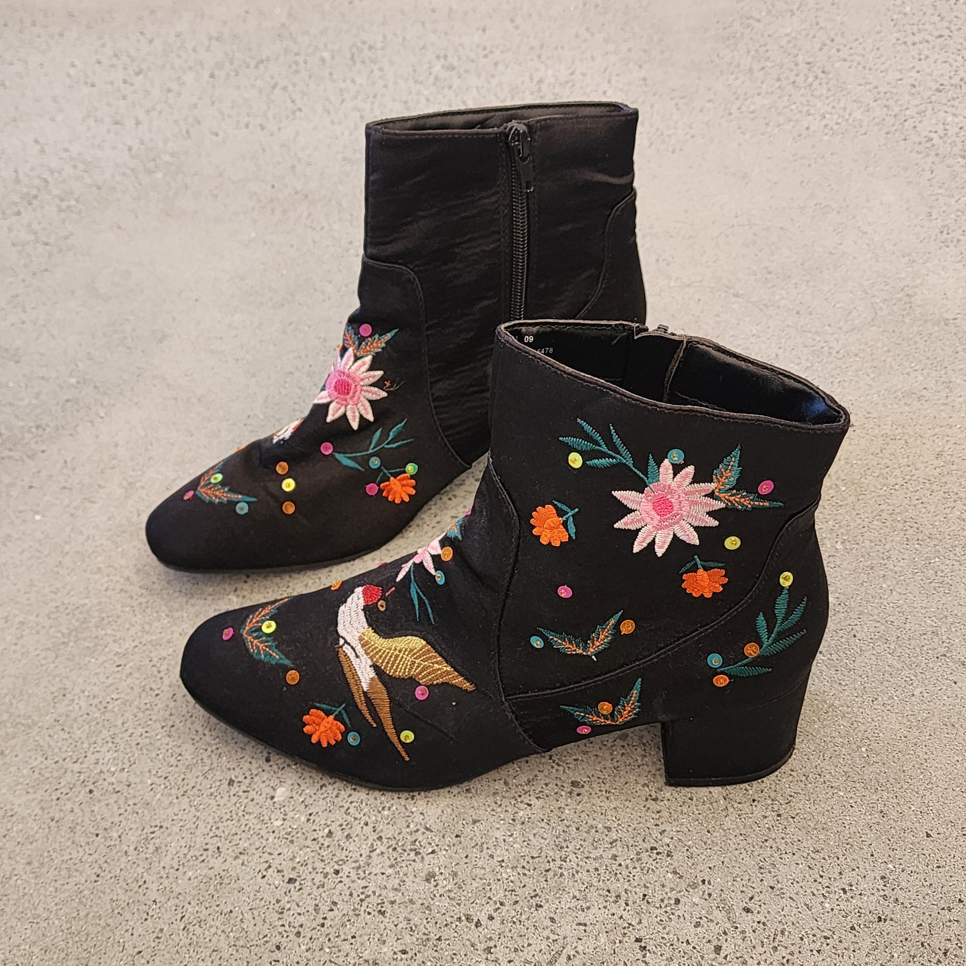 Floral embroidered black ankle boots, in excellent used condition, size 7
