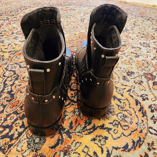 Back view of the Queen The Label studded boots showing the ankle pull detail and the soft leather.