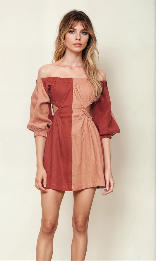 A cut out mini dress in linen by fashion label Sovere, absolutely beautiful in earthy contrasting panels. Available online at Wilson Avenue in size 8