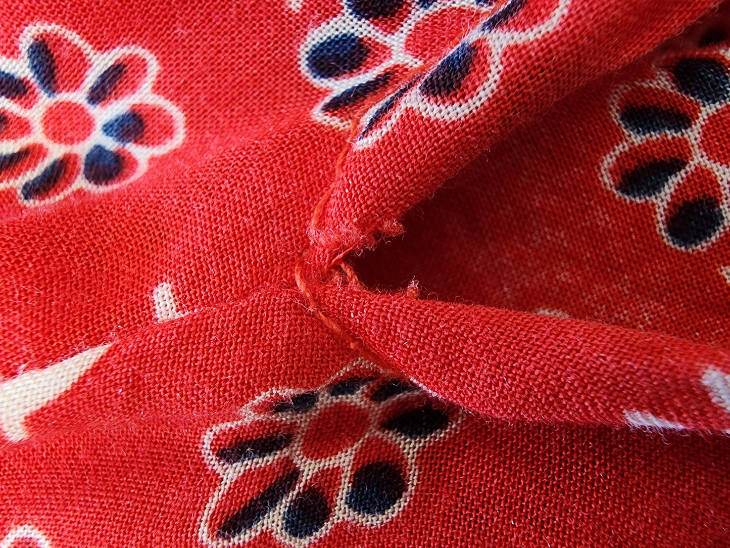 Close up of small rip at top of split on the spell gypsiana maxi skirt