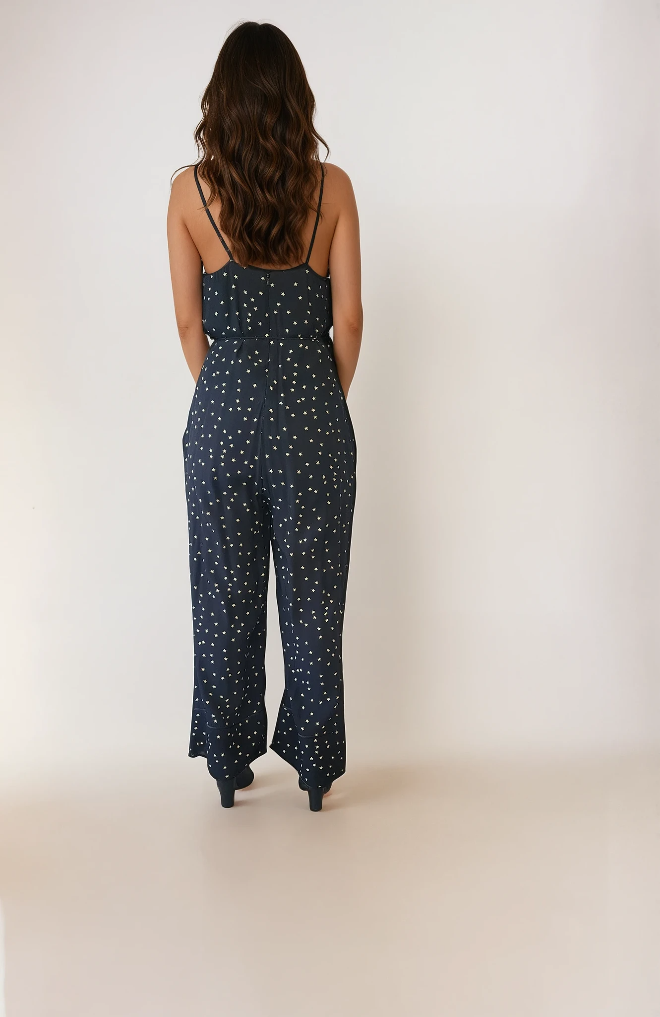 Designer Rebecca Vallance star jumpsuit with spaghetti straps and tie belt in size 6