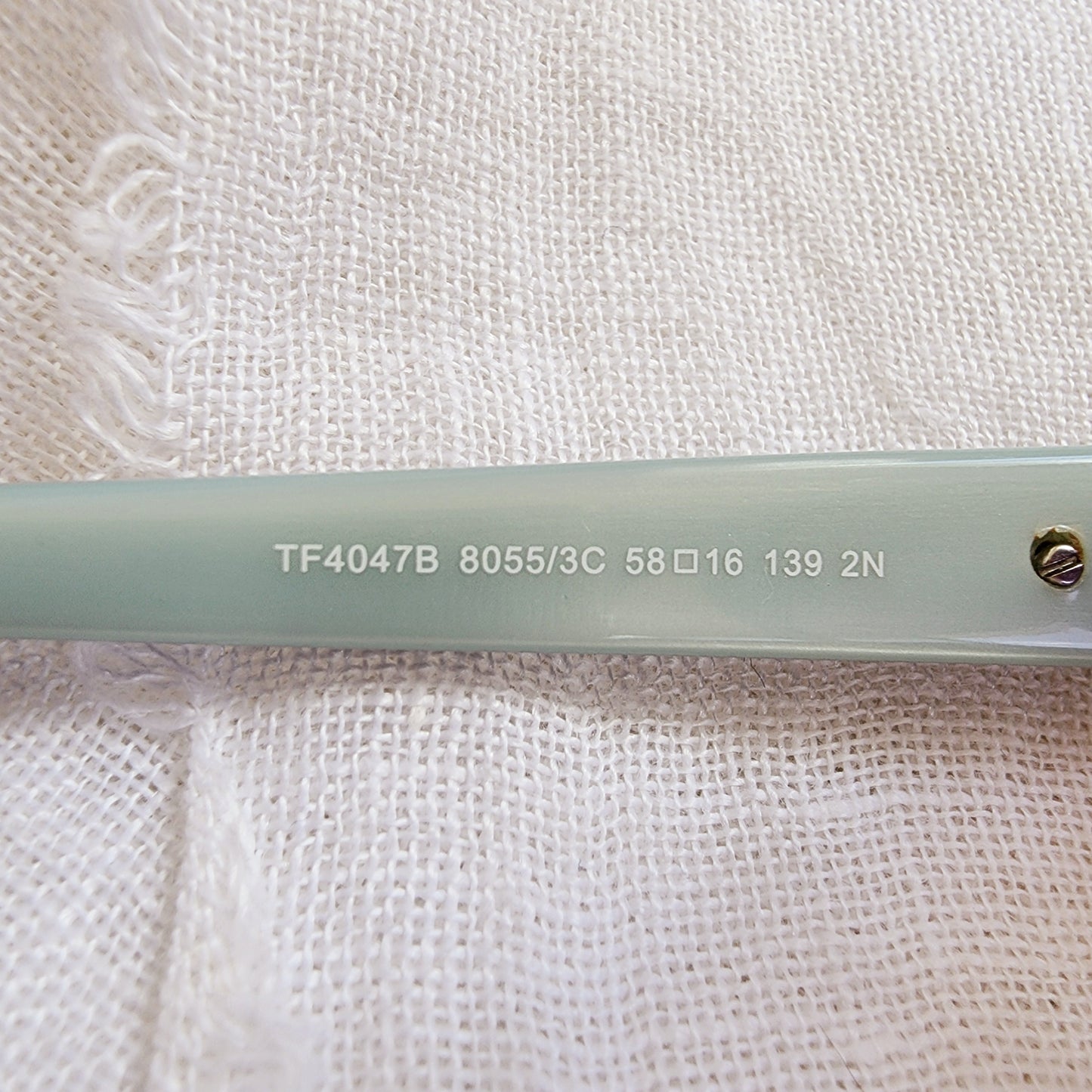 Close up of the Tiffany & Co. product code and style number on the left temple.