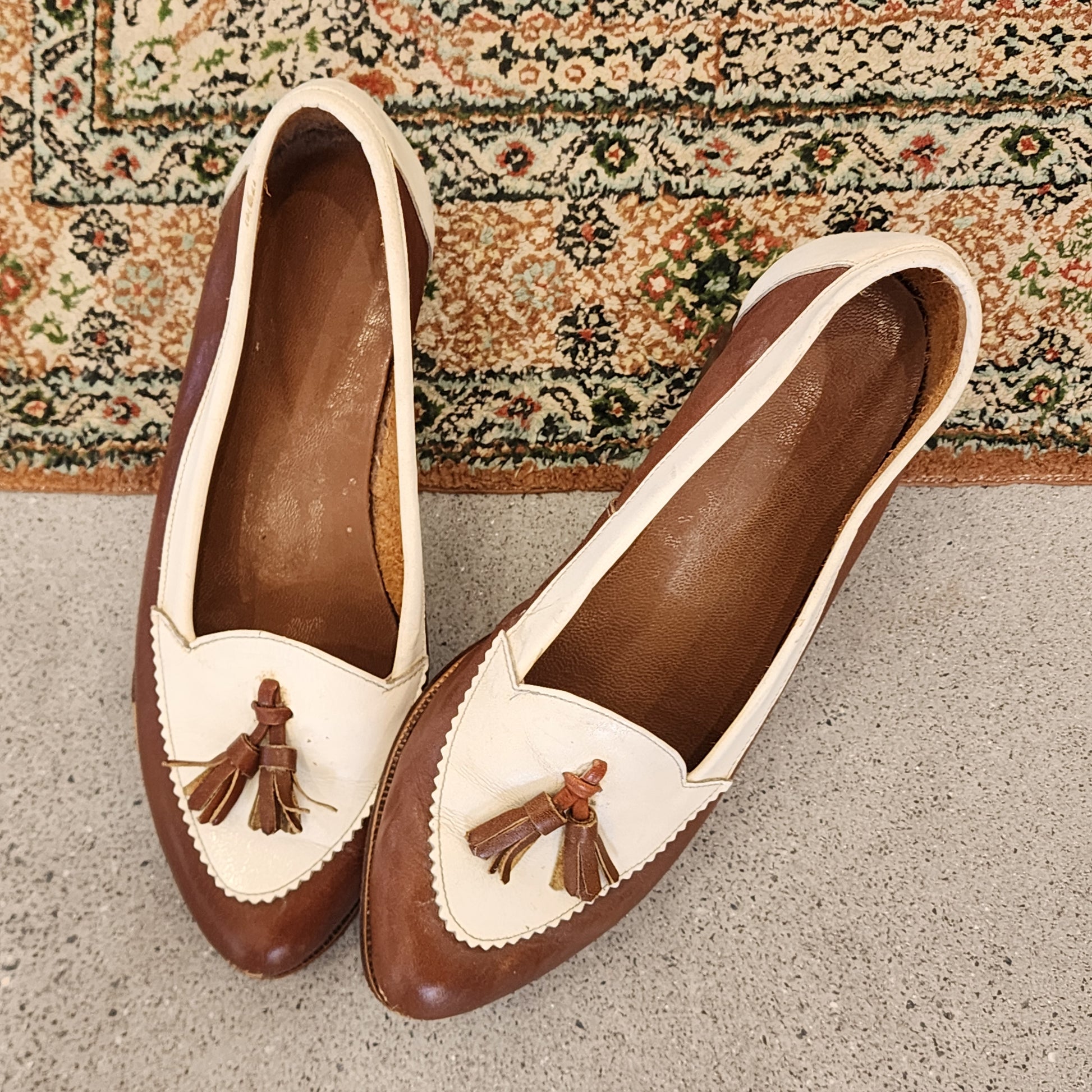 Vintage brown and white tassel loafers