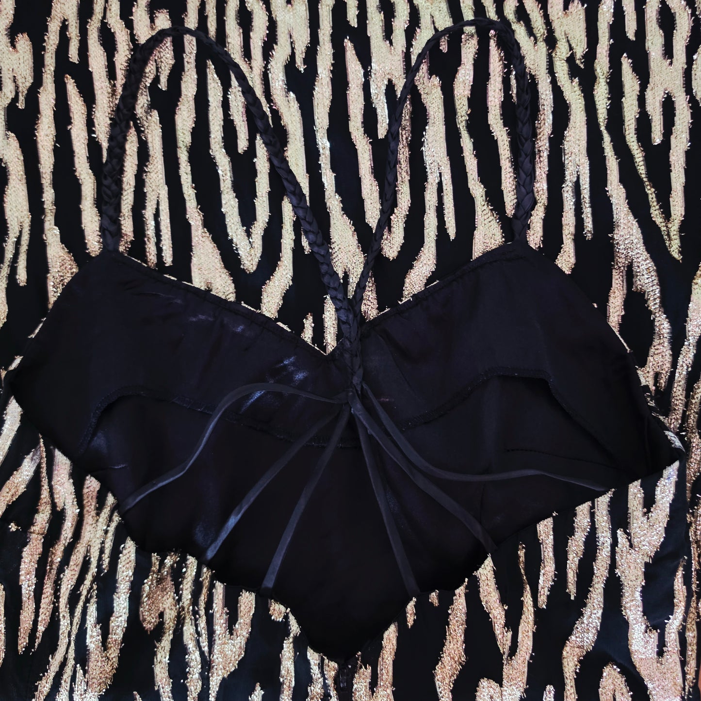 Close up of the braided straps and themetallic fabric on the Vintage Zebra Metallic Mini Dress