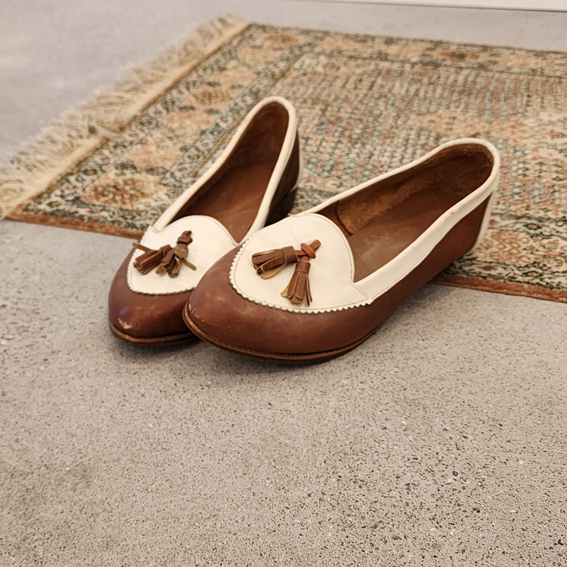 Vintage brown and white tassel loafers