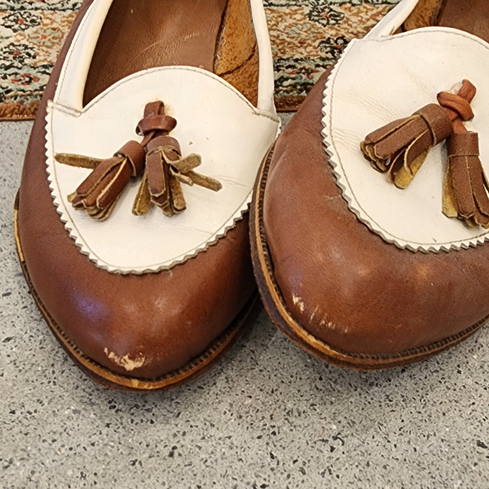 Vintage brown and white tassel loafers