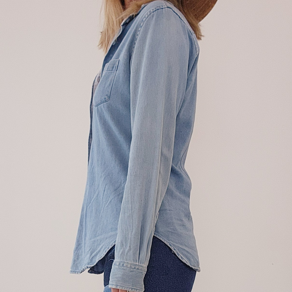 Blue chambray style button up shirt by designer Assembly Label size 6