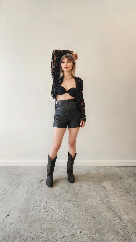 Model showing the front of the Winona sheer sequin cropped jacket with tie  front, showing the semi-sheer style.