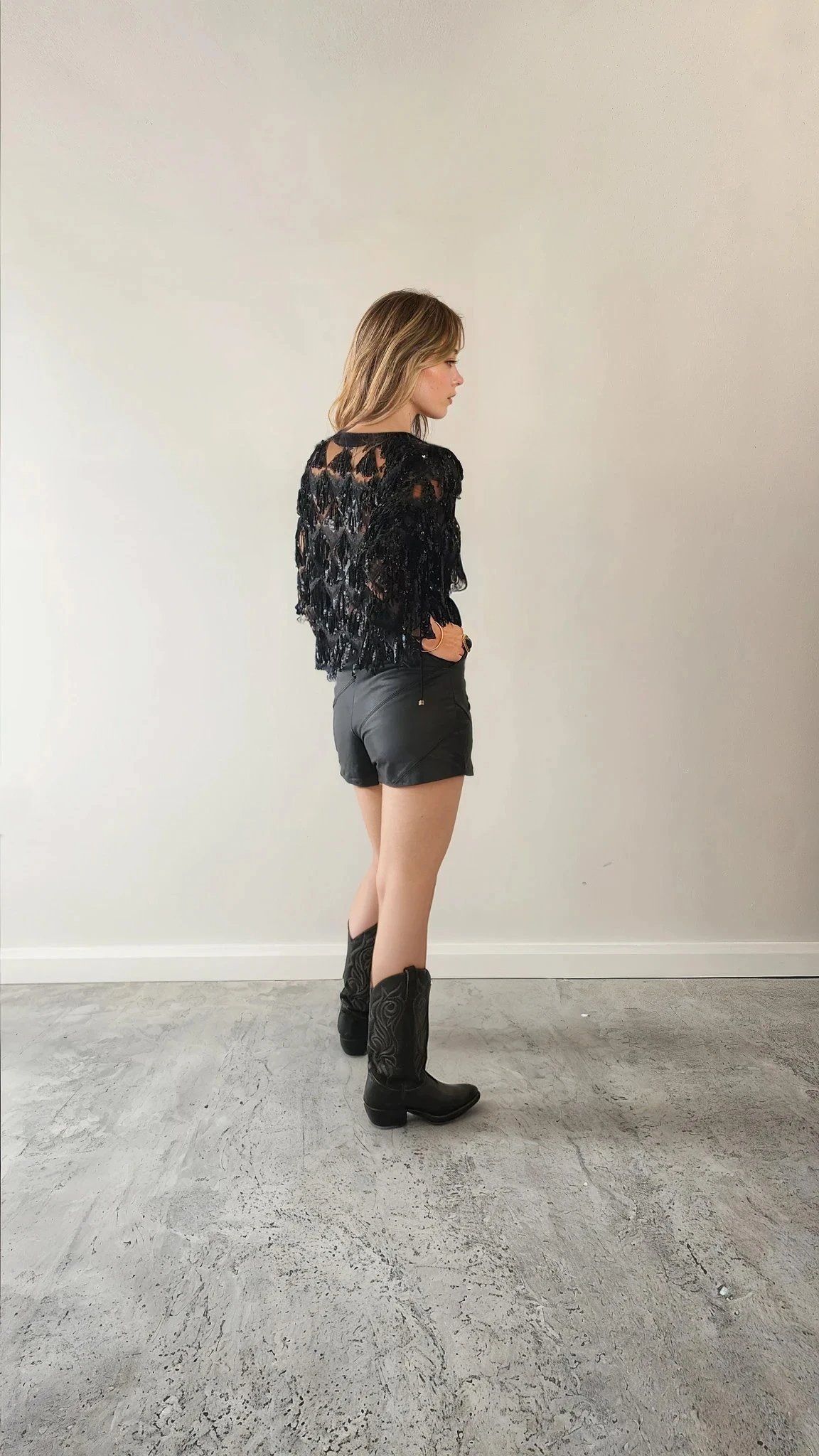 Model wearing the Winona Australia jacket showing the sheer sequin cropped style.