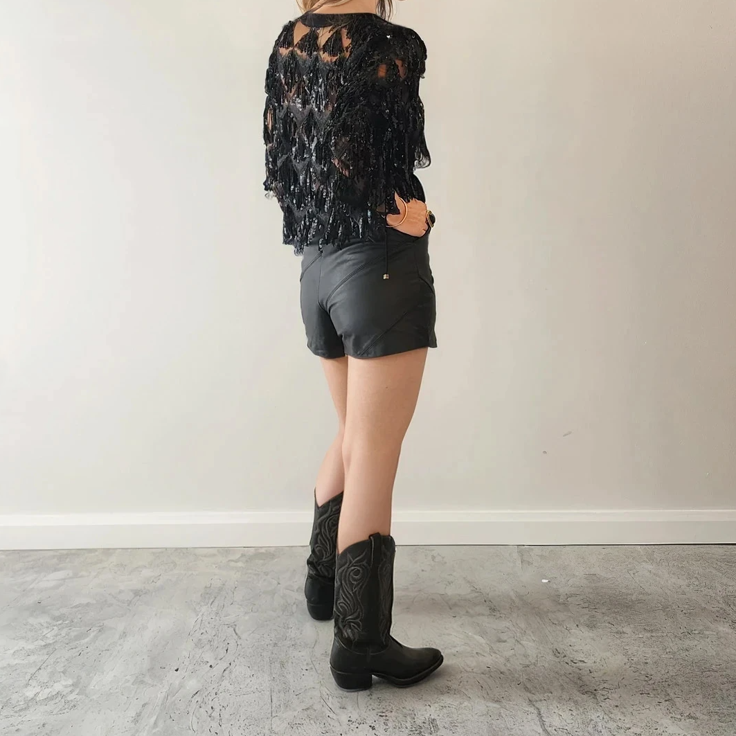 Model wearing the Winona Australia jacket showing the sheer sequin cropped style.