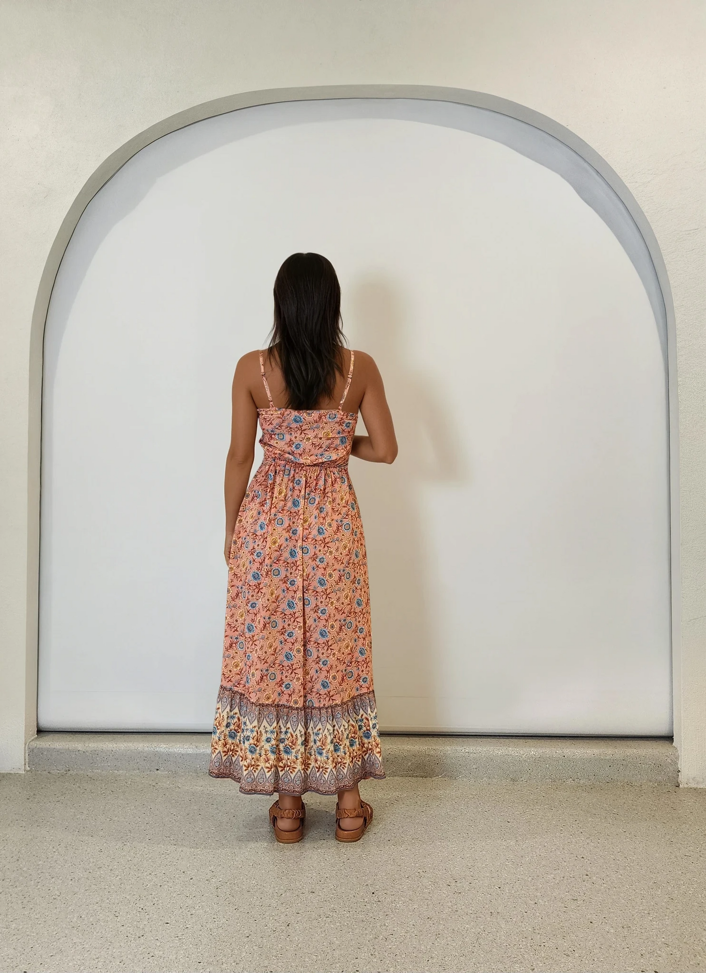 Back view of Arnhem Bijoux dress featuring full length skirt and soft back.