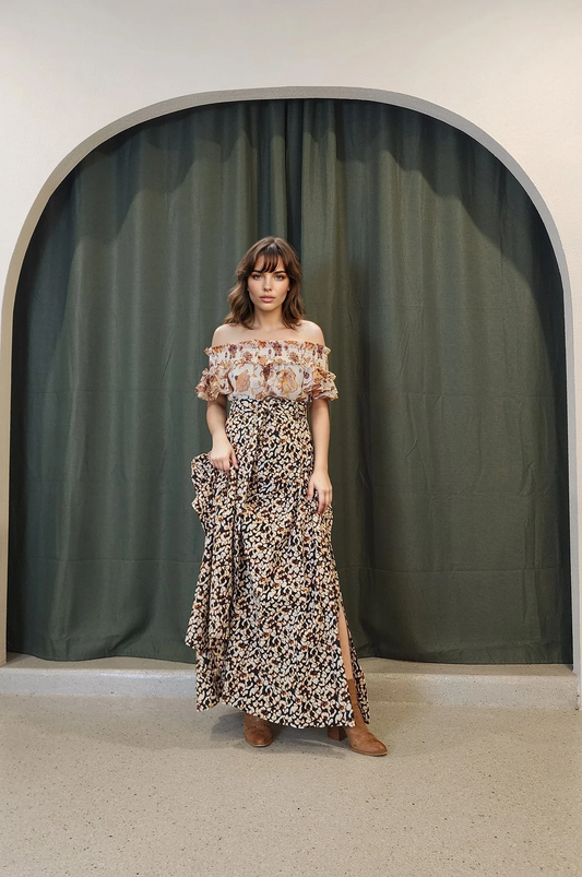 Model wearing Camilla & Marc Willow skirt showing the abstract animal print and side slit.