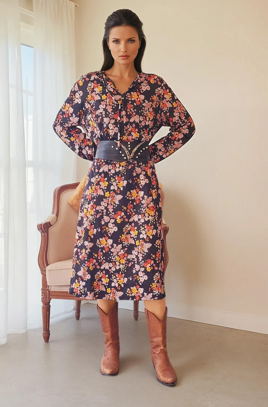 Front view of the vintage Kitly Fashions floral midi dress, styled with cowboy boots and a black belt.