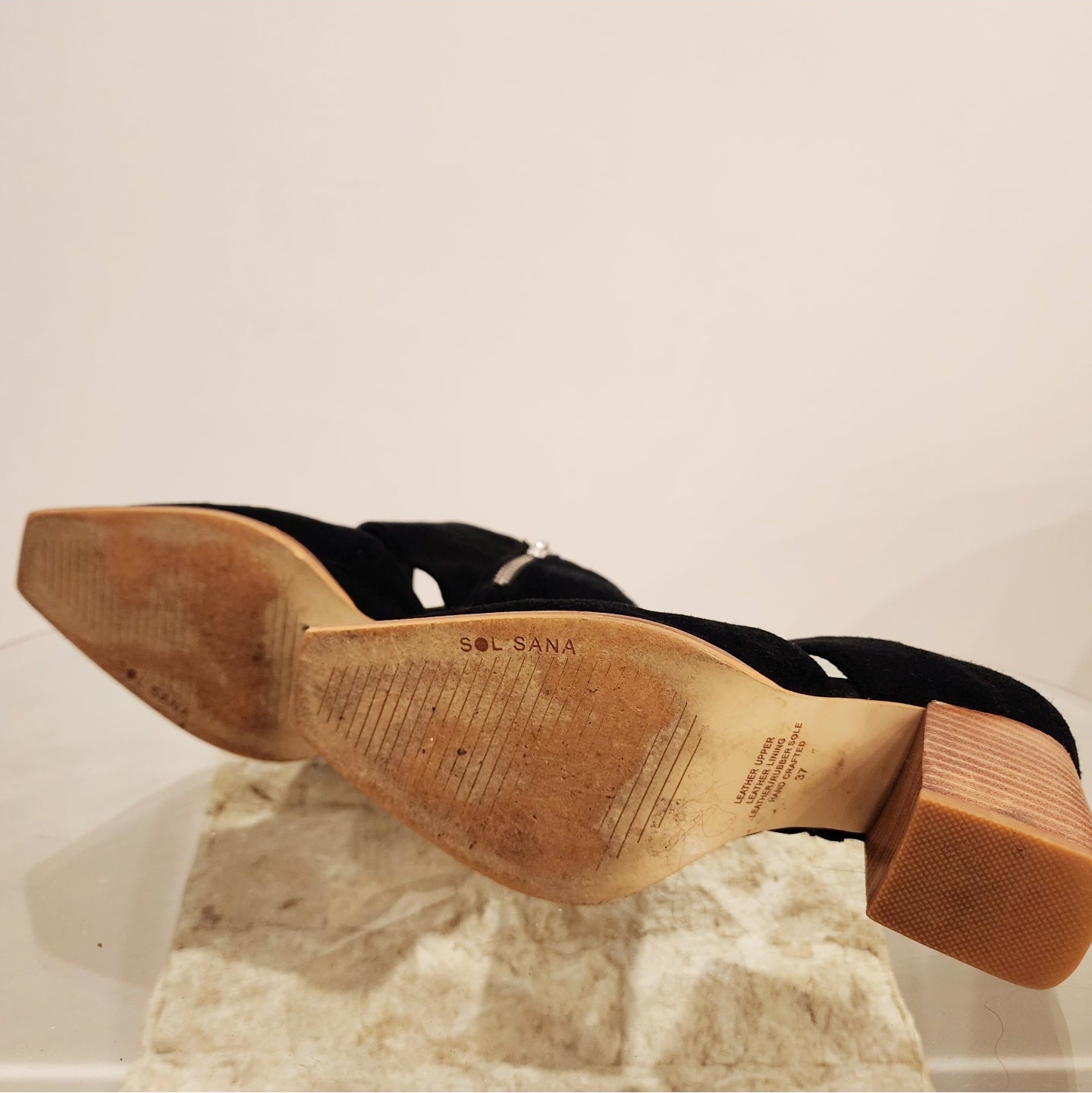 Sol Sana cut out boots in black suede, with a block heel and squared toe detail. bottom view showing wear to sole.