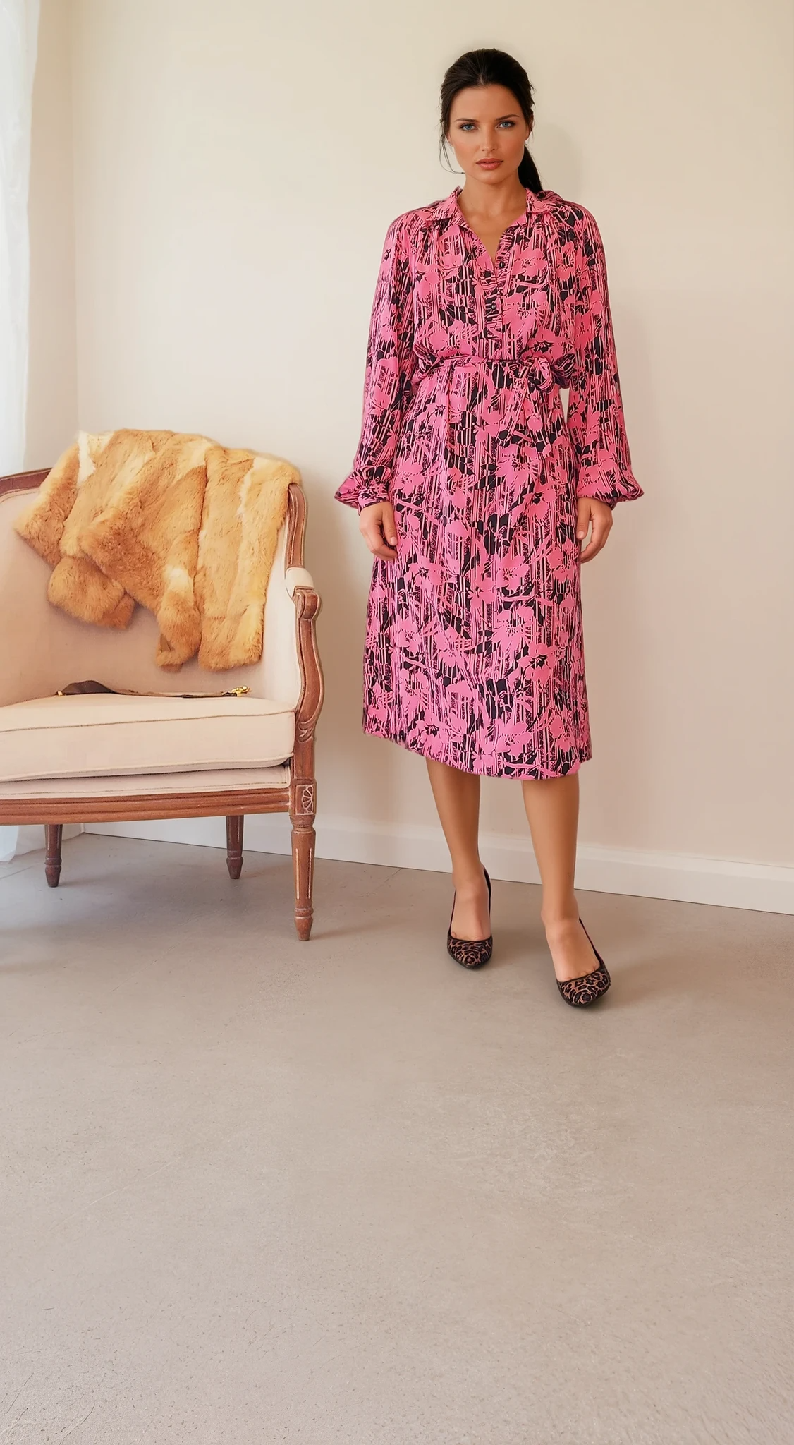 Front view of vintage Noble Frocks Sydney midi dress in hot pink with black abstract floral print, button-up collar, and waist tie.