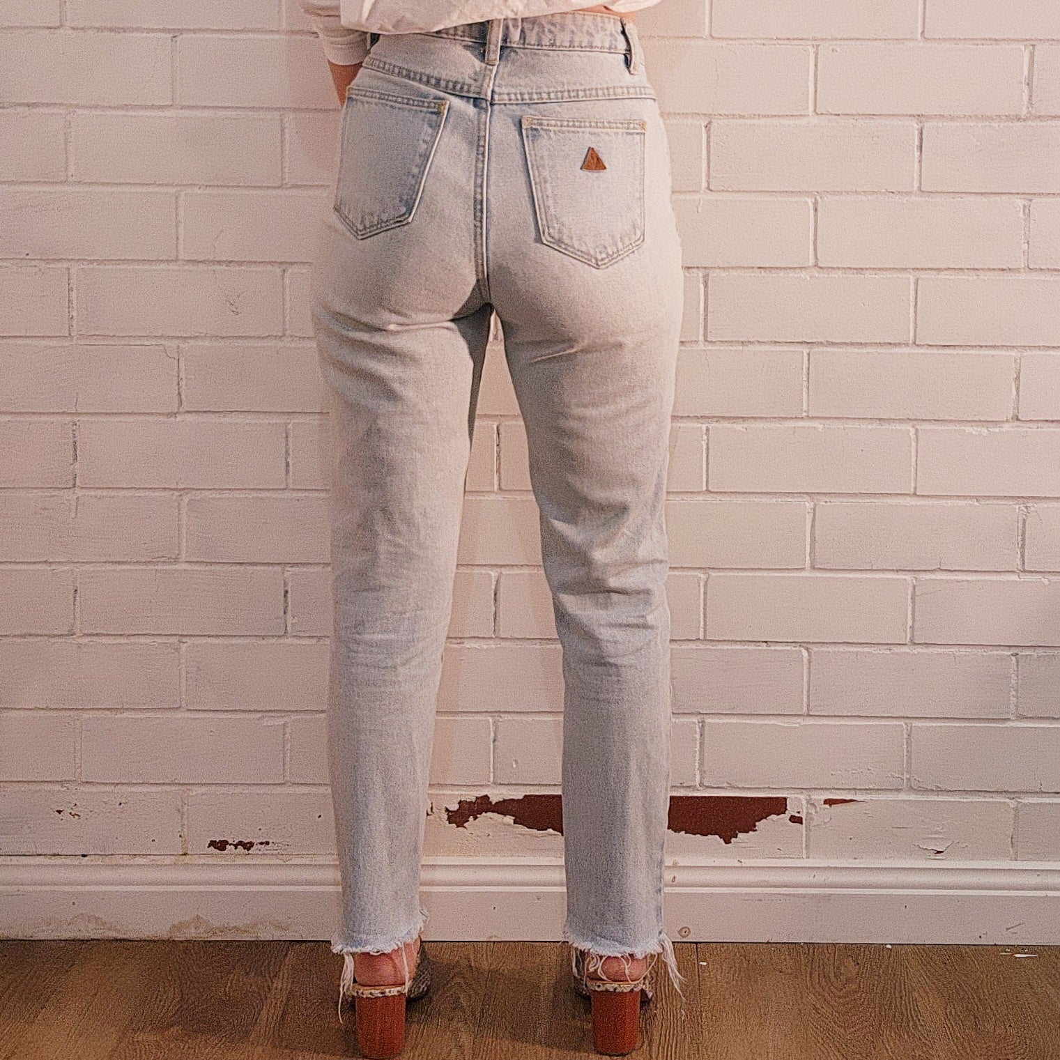 Abrand 94 high slim jeans, size 27/9. Light wash frayed hem blue denim jeans