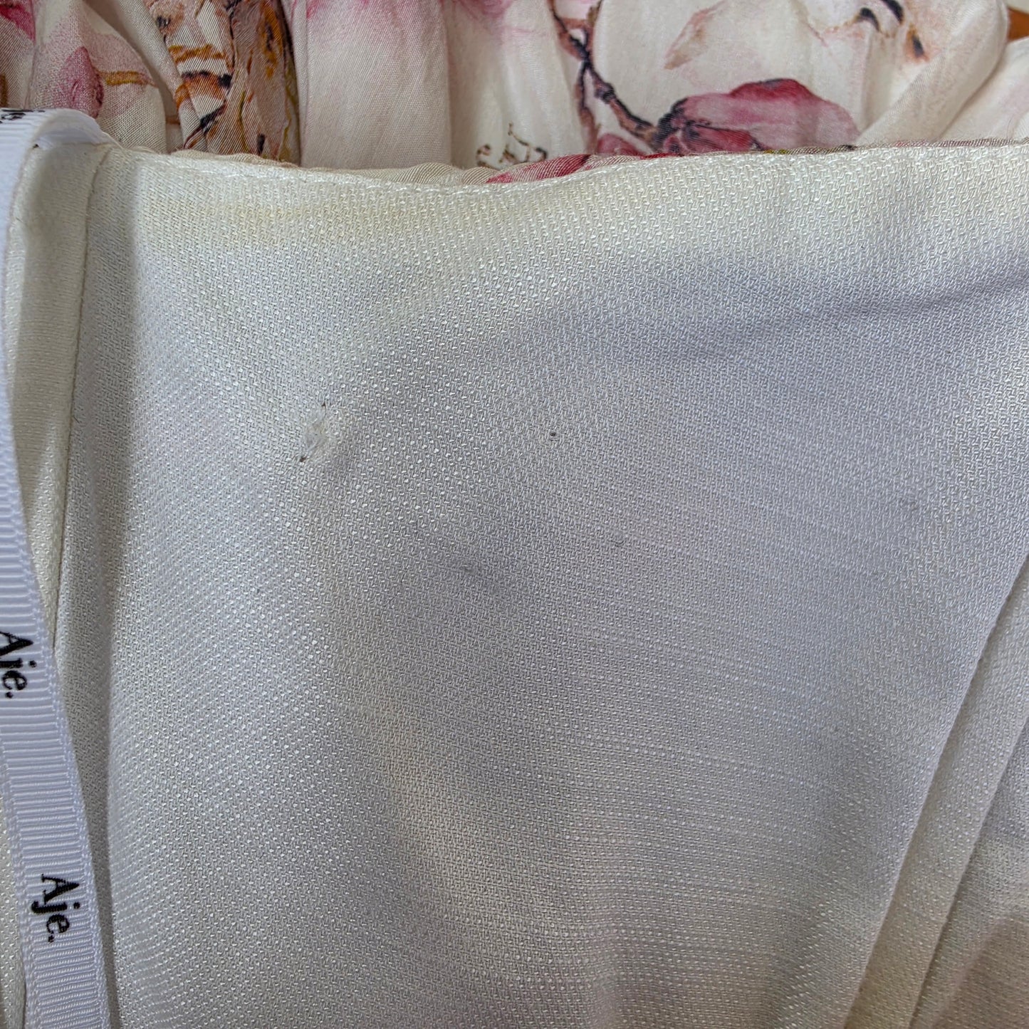 A close-up of the inside of the Aje bodice showing the discolouration under the arm.