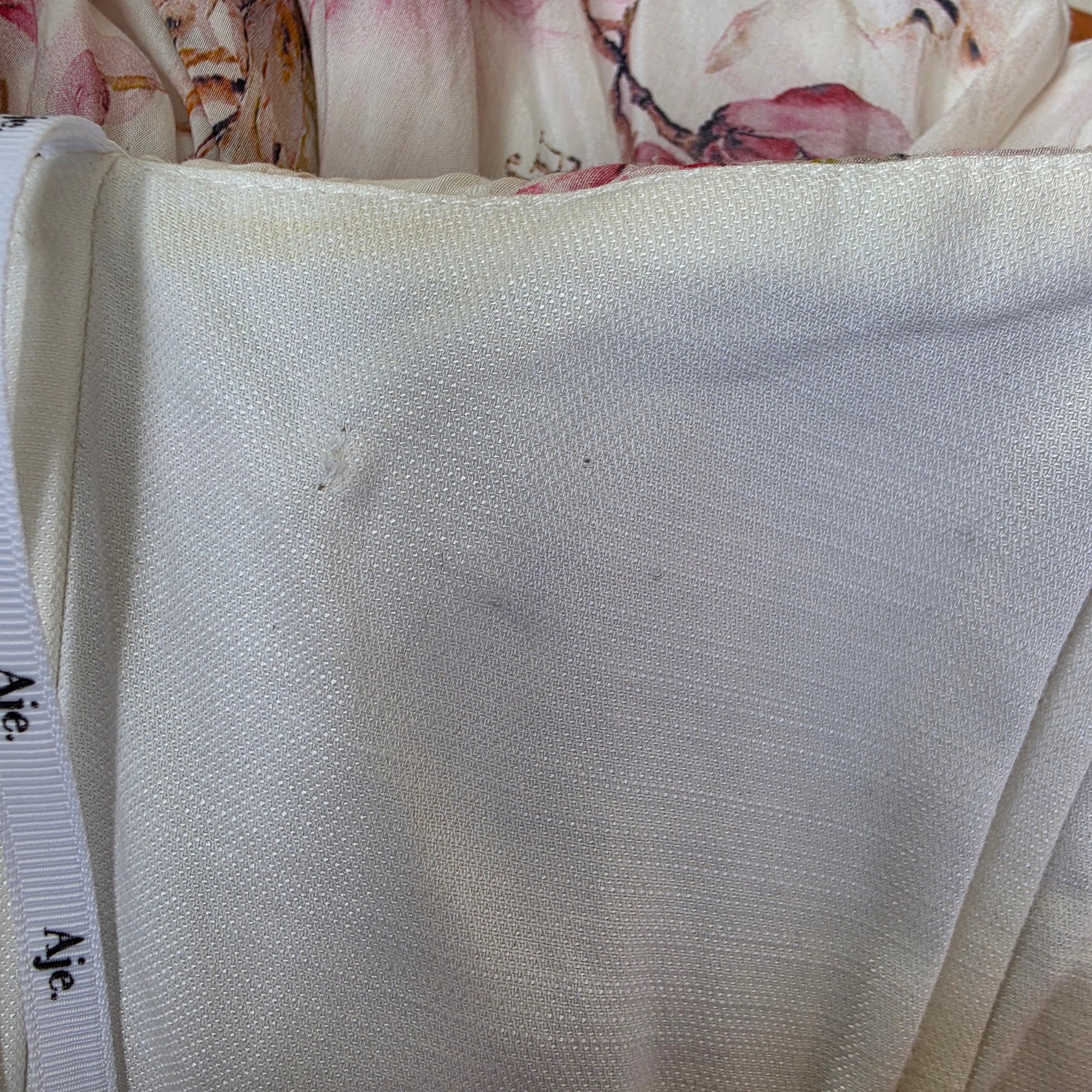 A close-up of the inside of the Aje bodice showing the discolouration under the arm.