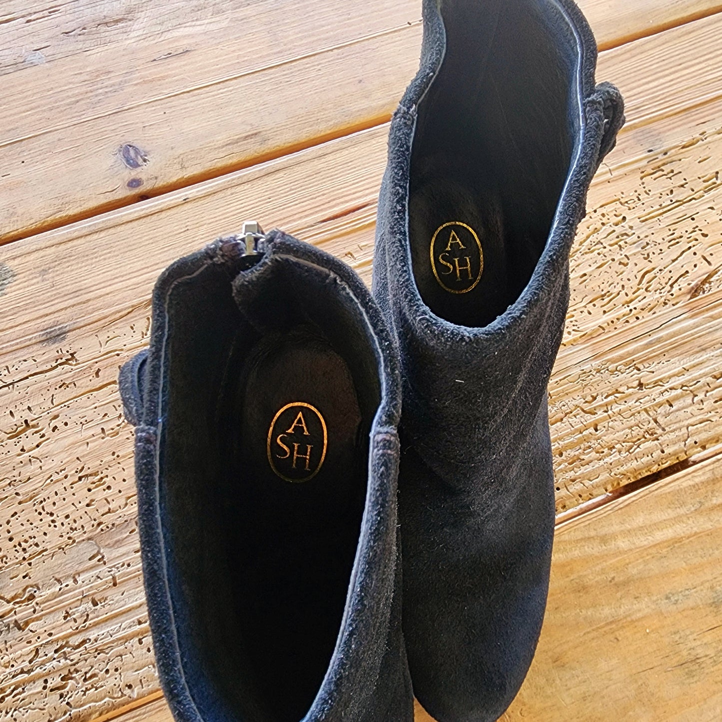 Tip view of the Ash fringe suede boots showing the inside name brand and suede finish of the boots.
