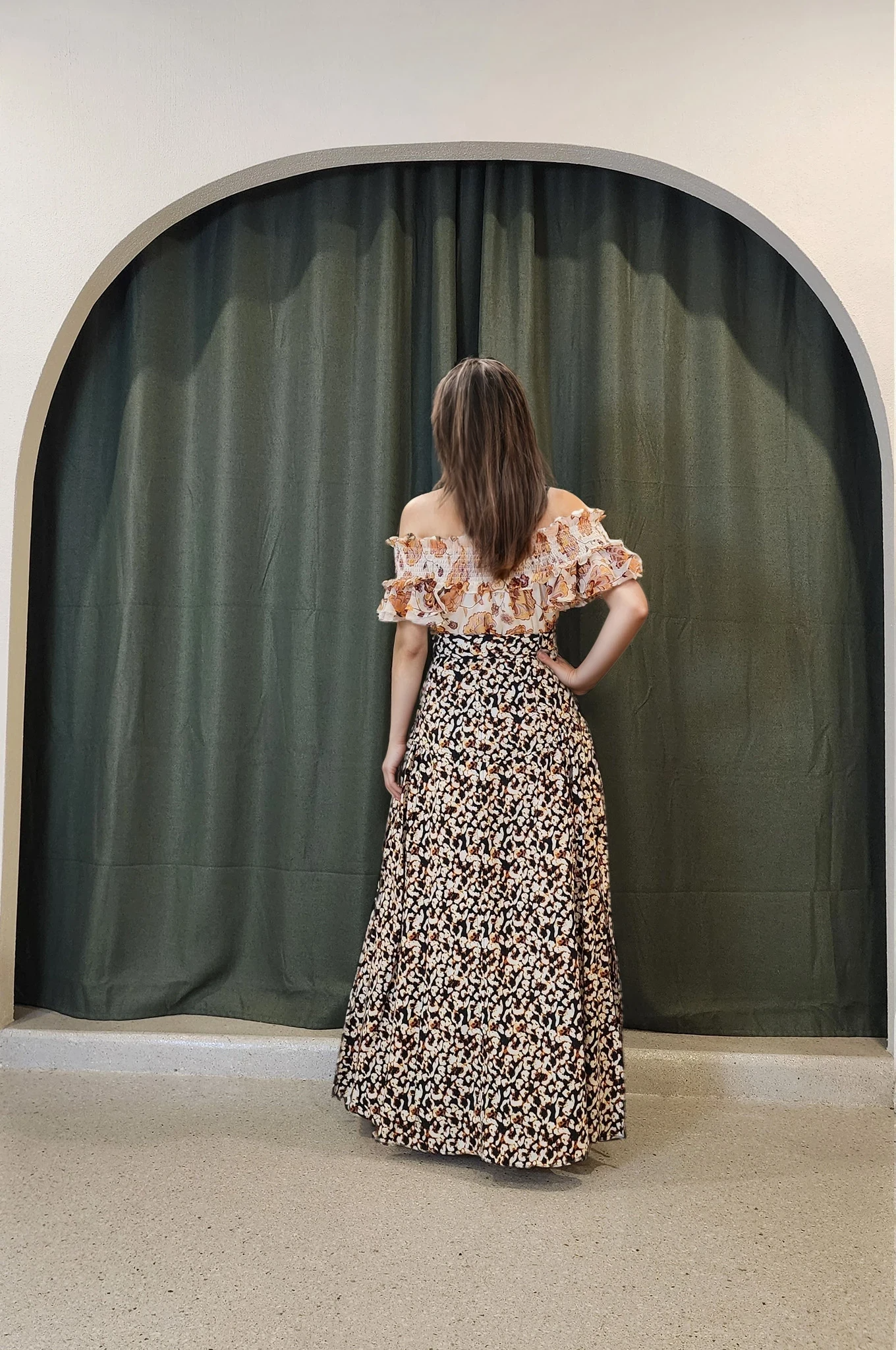 Model wearing the Willow skirt, showing the soft A-line shape, high waistline and abstract print.