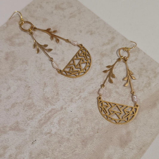 Top view of the Coral handmade pearl earrings, showing the unique shape and irregularities of the natural pearls