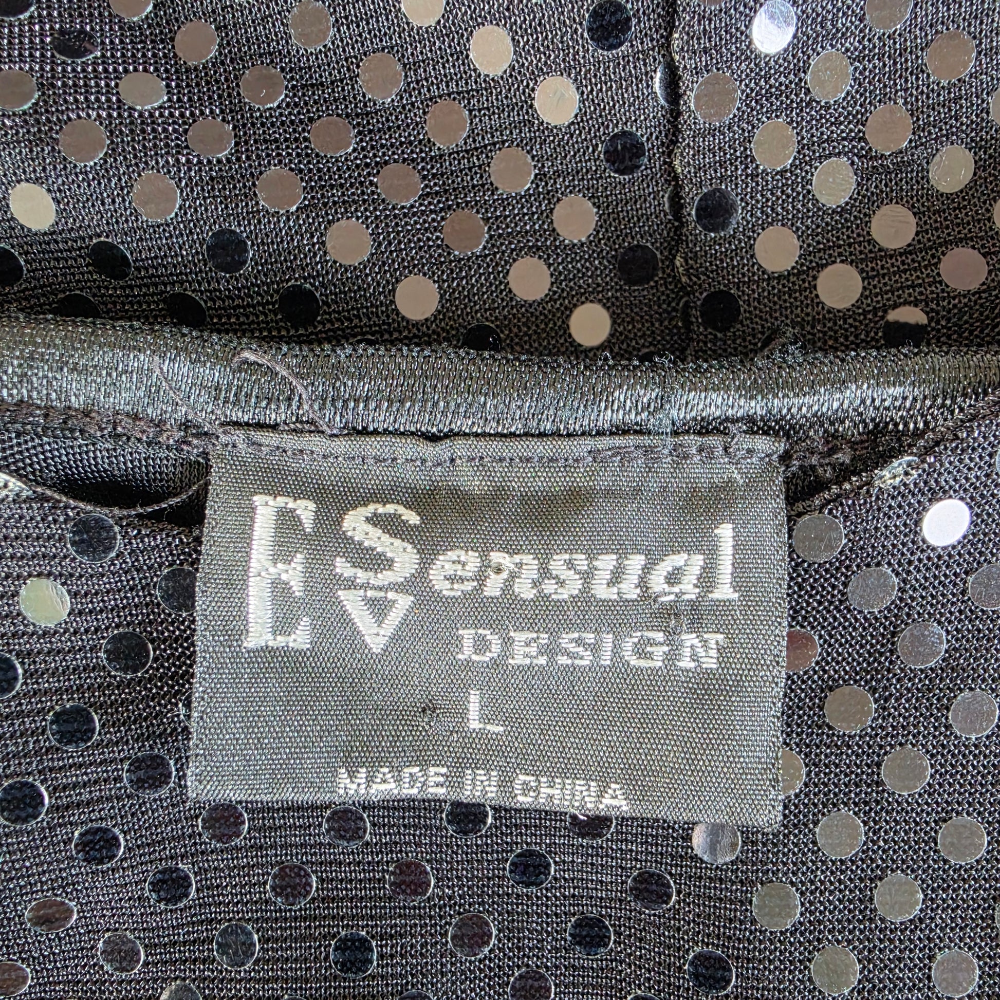 Image showing the label of the E Sensual Design Micro Dot Dress in Size L