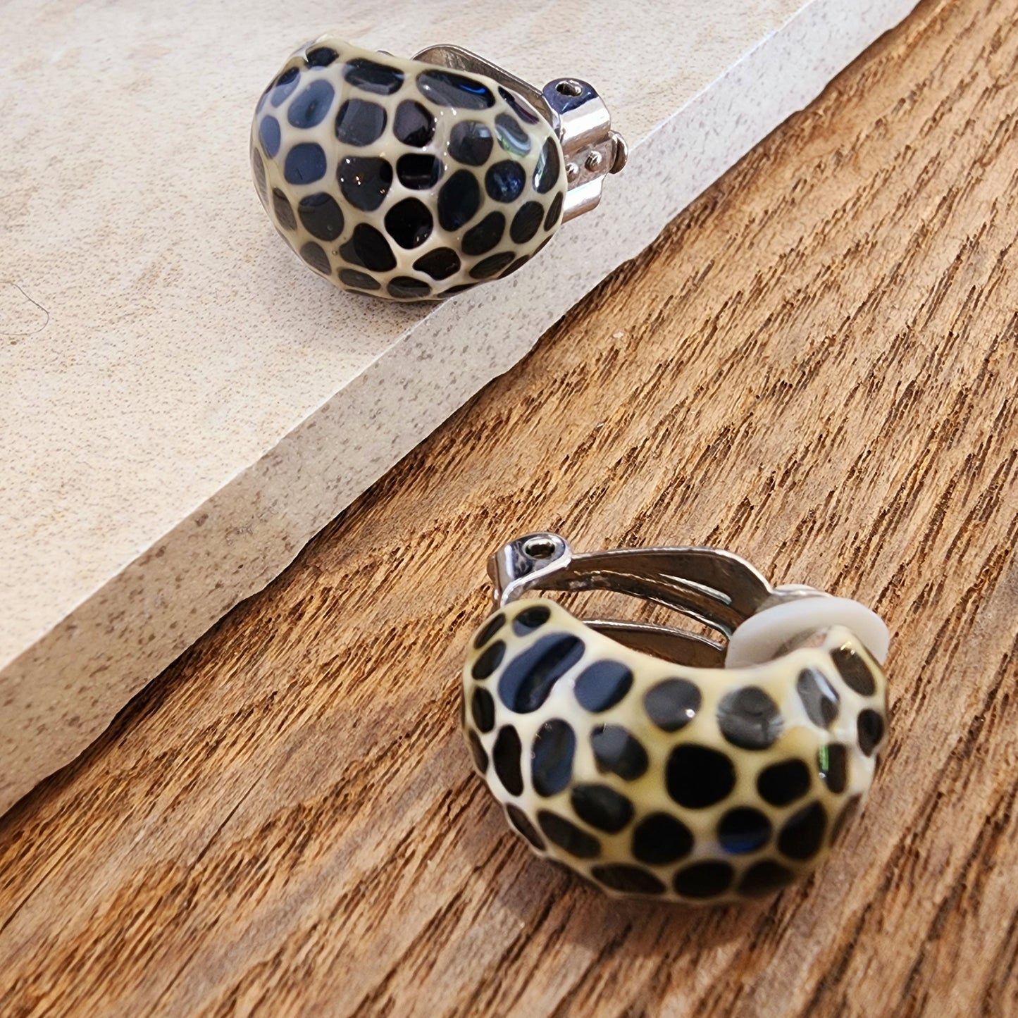 Dalmation spot clip on earrings, black white and beige.