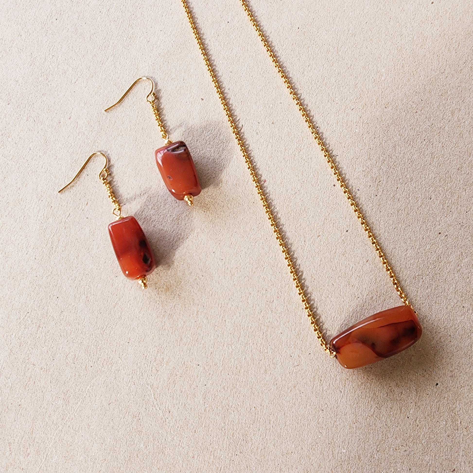 Image showing the handmade agate drop earring and necklace set crafted with recycled beads.