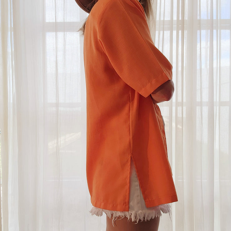 90's style embroidered button up in tangerine. 