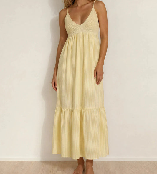 Front view of the La Maison Talulah Layla Dress, showing the yellow striped fabric and midi length.