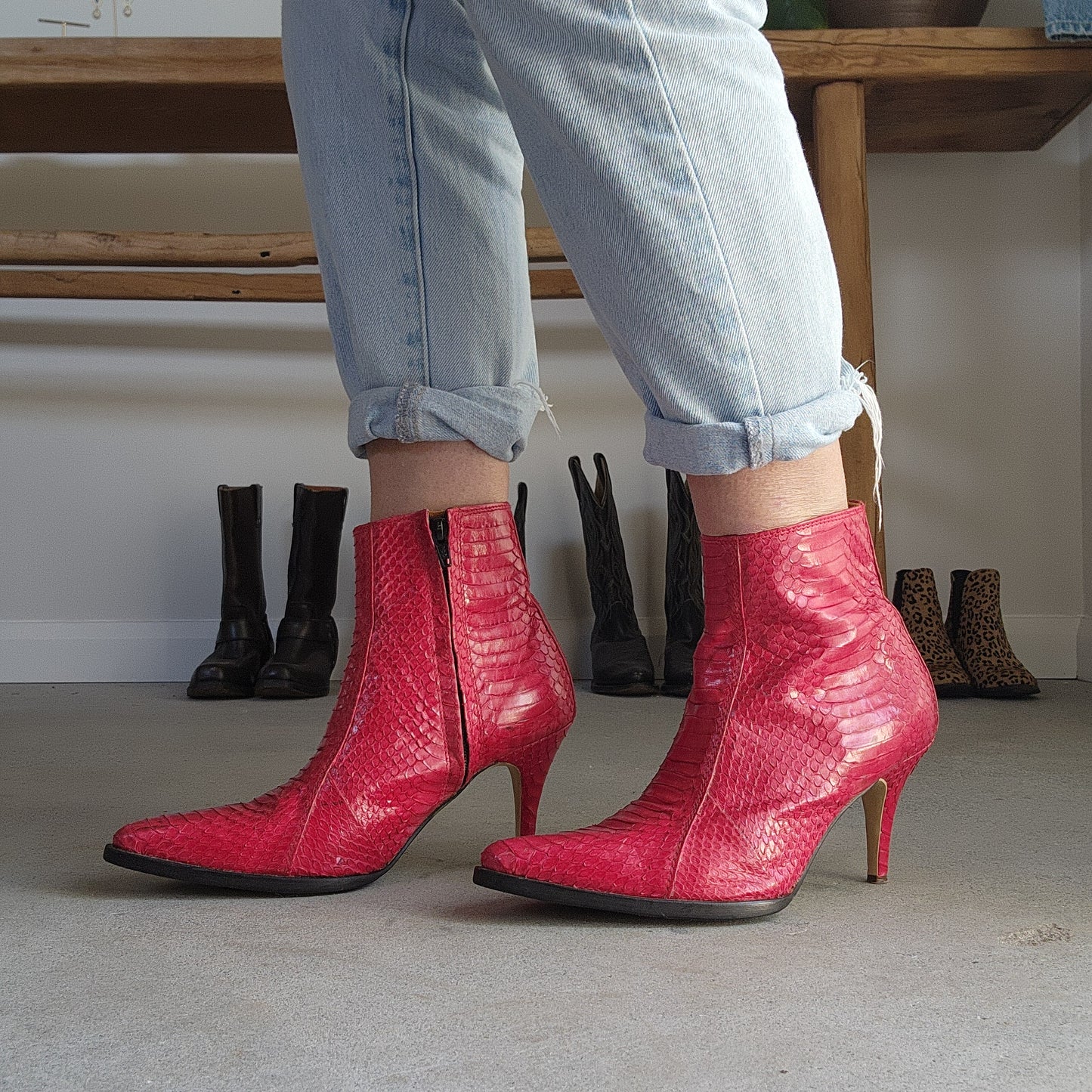 Wonderful worn red snakeskin boots. Western ankle stiletto heel boots