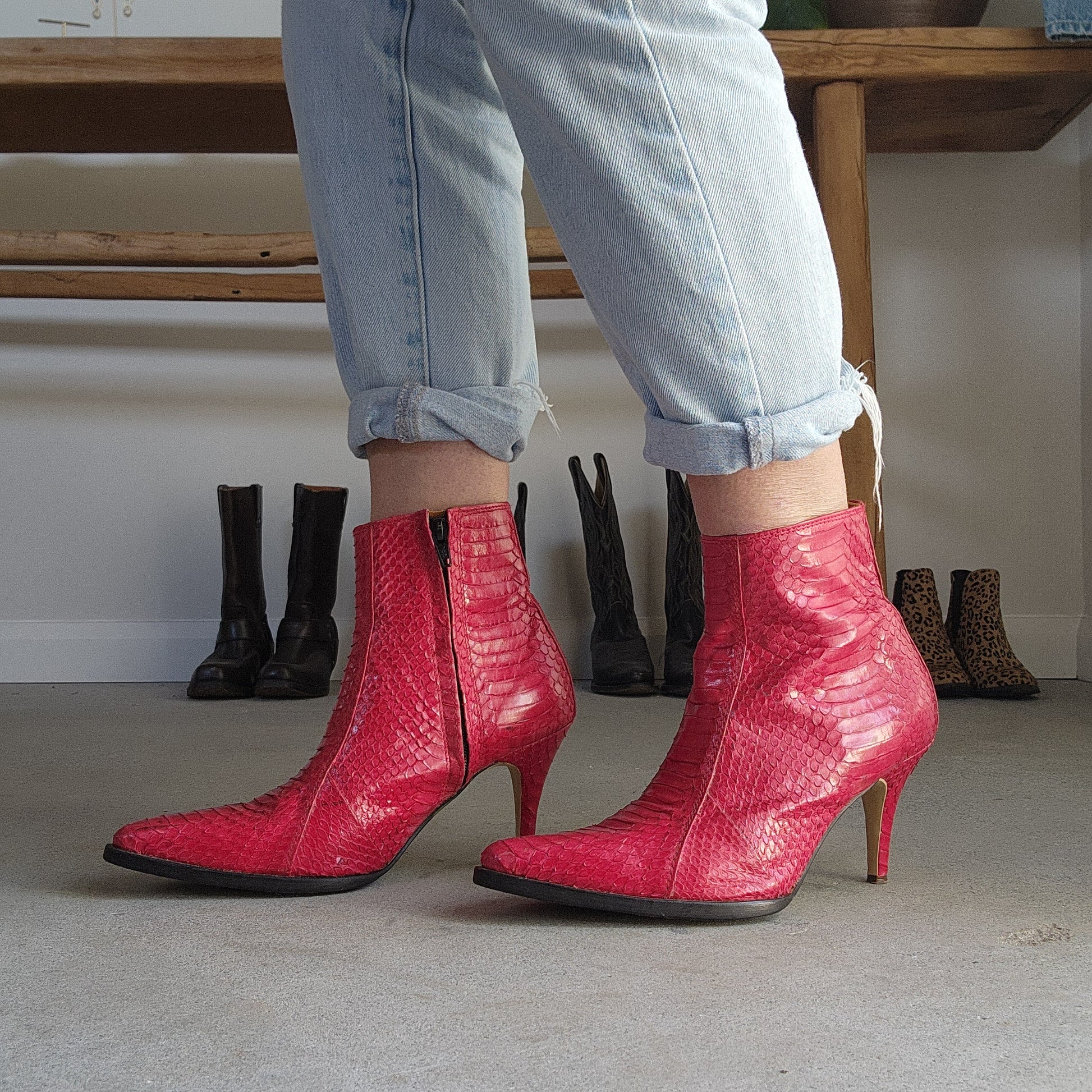 Wonderful worn red snakeskin boots. Western ankle stiletto heel boots