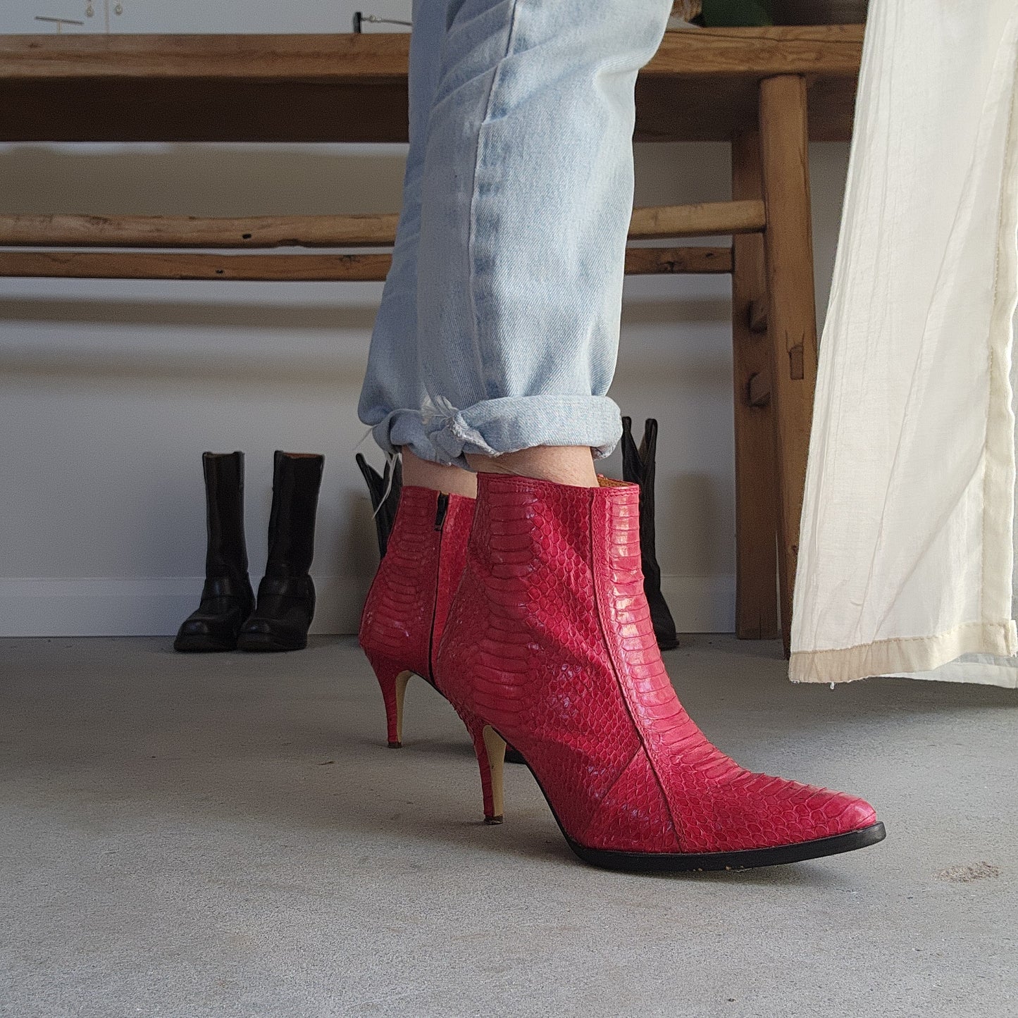 Wonderful worn red snakeskin boots. Western ankle stiletto heel boots
