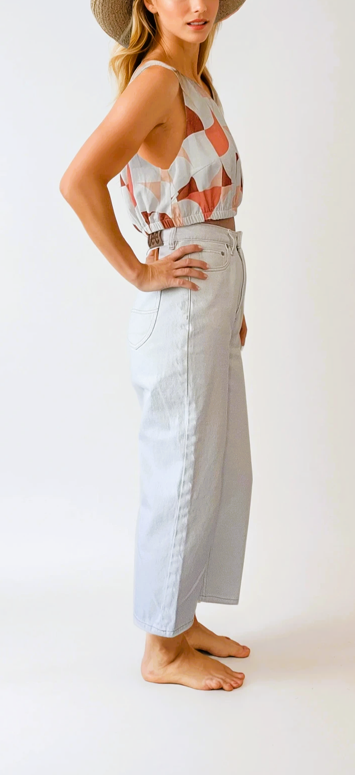 Side view of the Seven Wonders one shoulder crop top. The retro print gives us 70s poolside vibes. Available online at Wilson Avenue