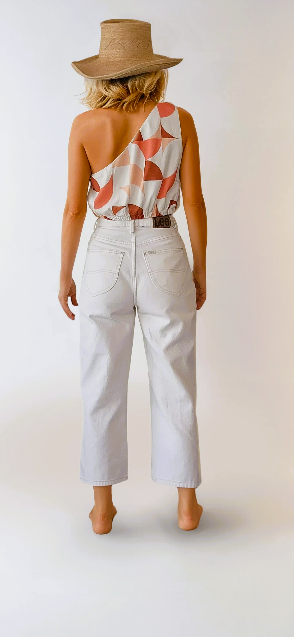 Stunning Seven Wonders one shoulder crop top in a retro 70s style print. Available in size L at Wilsonavenue.au