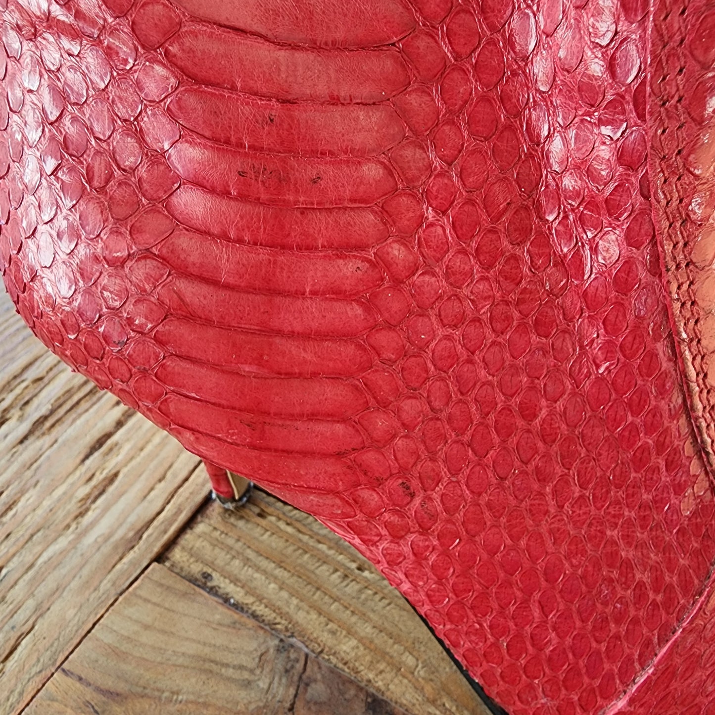 Wonderful worn red snakeskin boots. Western ankle stiletto heel boots